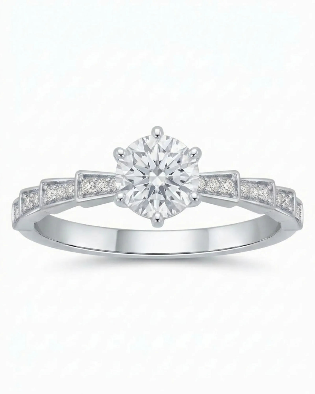 Amora Échelle d’Amour round diamond engagement ring front profile with stepped pavé shoulders in 18K white gold | SARATTI