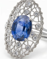 Antique-inspired sapphire ring with openwork diamond halo in polished platinum - SARATTI