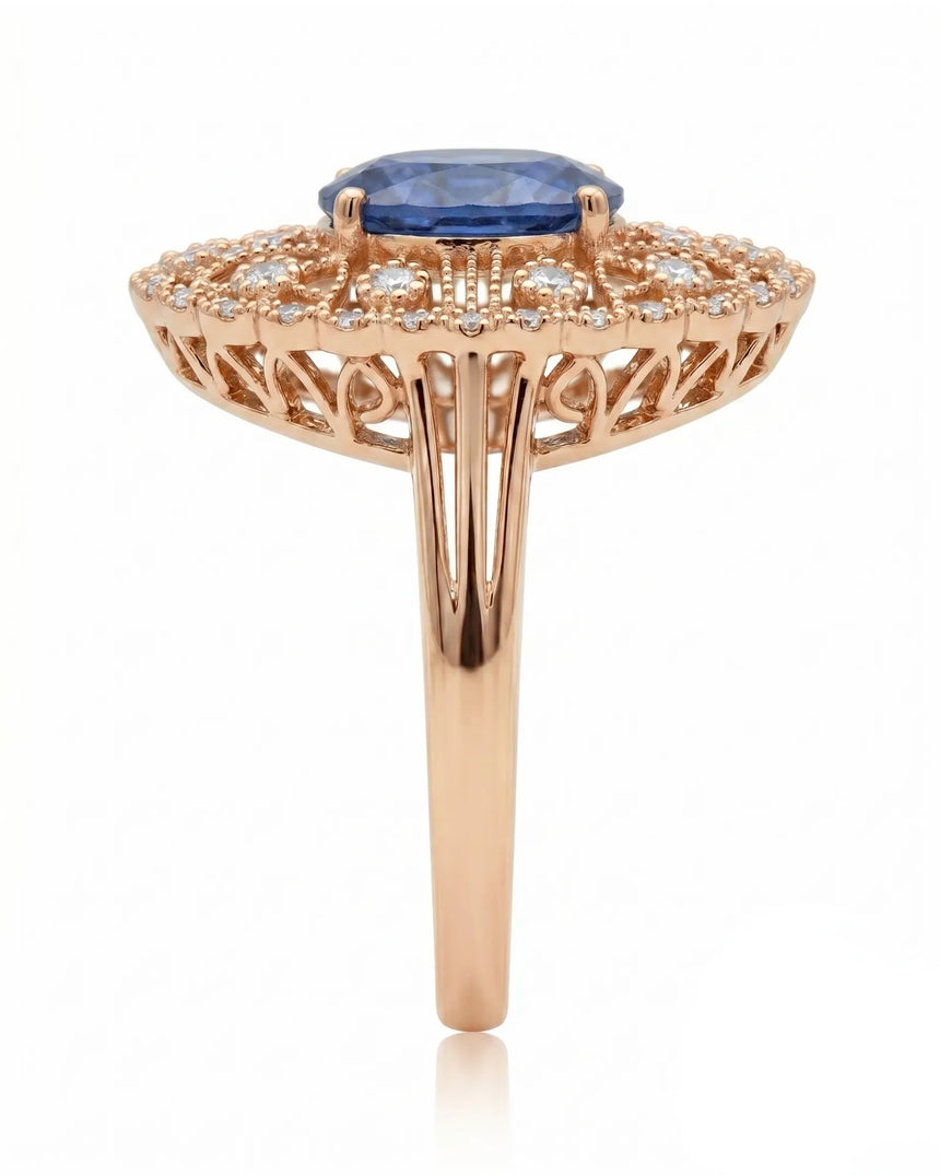 Antique-inspired sapphire ring with openwork diamond halo in romantic rose gold | SARATTI