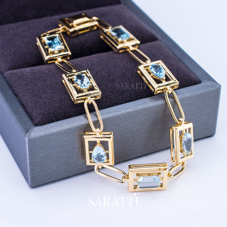 Pear Cut, Emerald Cut and Oval Cut Aquamarine Bracelet in Yellow Gold - Saratti Jewelry