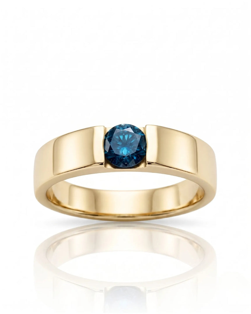 Architectural blue diamond ring featuring a sculpted wide band and clean 18K yellow gold surfaces | SARATTI