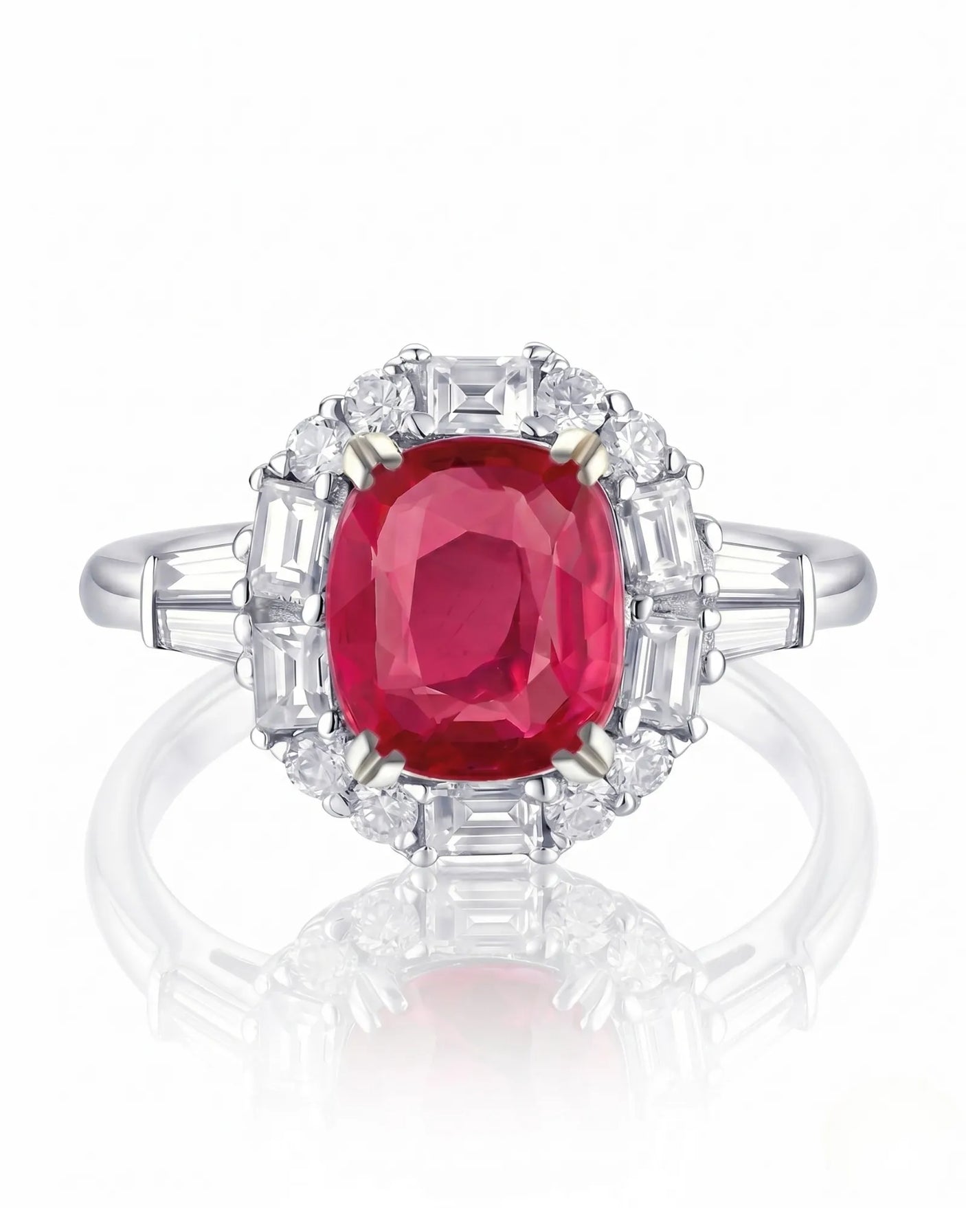 Architectural ruby ring with round, baguette, and emerald-cut diamonds in platinum | SARATTI