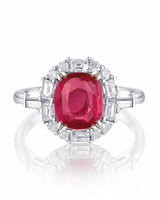 Architectural ruby ring with round, baguette, and emerald-cut diamonds in platinum | SARATTI