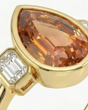 Architectural three-stone Topaz setting with polished yellow gold band | SARATTI