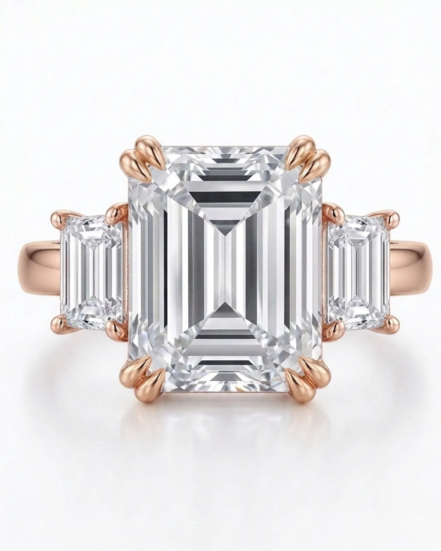 Architectural three stone moissanite engagement ring with soft rose gold setting | SARATTI