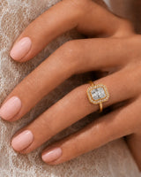 Architectural yellow gold radiant cut ring with brilliant halo-set moissanite | SARATTI