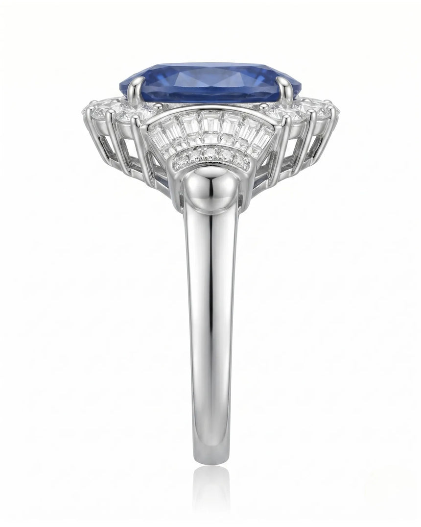 Art Deco sapphire ring with round and tapered baguette diamonds in polished platinum | SARATTI