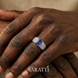 Mens ring with tanzanite and diamonds worn on hand in platinum | SARATTI