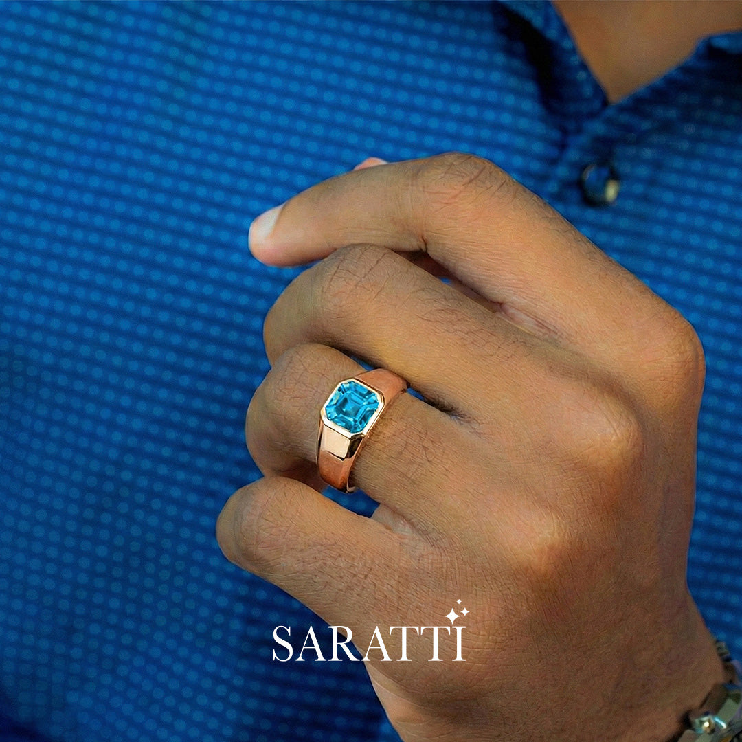 Mens blue topaz ring worn on hand in 18K rose gold | SARATTI