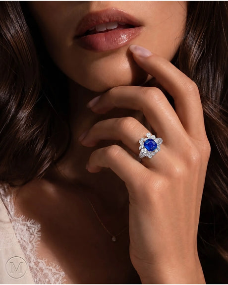 Asymmetrical sapphire ring with pear, round, and marquise diamonds in 18K white gold | SARATTI
