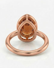 Aurex rose gold setting for a selected pear-shaped Imperial Topaz | SARATTI