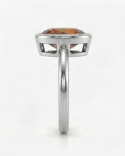 Aurex white gold setting with a smooth pear-shaped Topaz bezel | SARATTI