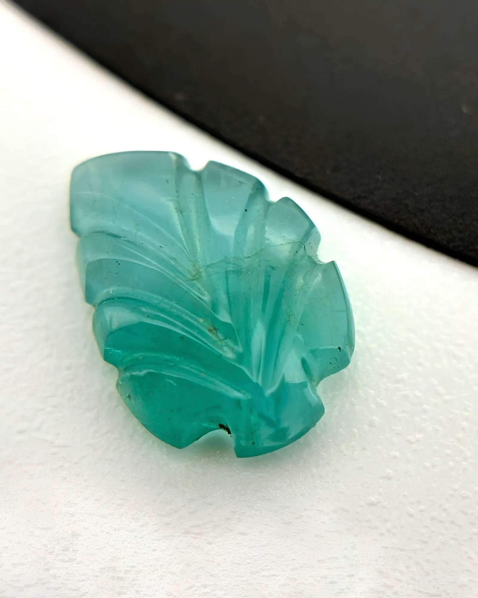 Back view of 1.86ct Natural Emerald carved leaf gemstone | SARATTI