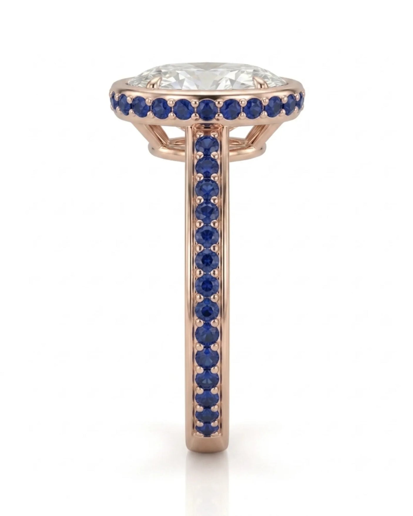 Bezel-set oval natural diamond ring with contrasting sapphire halo in romantic 18K rose gold | SARATTI
