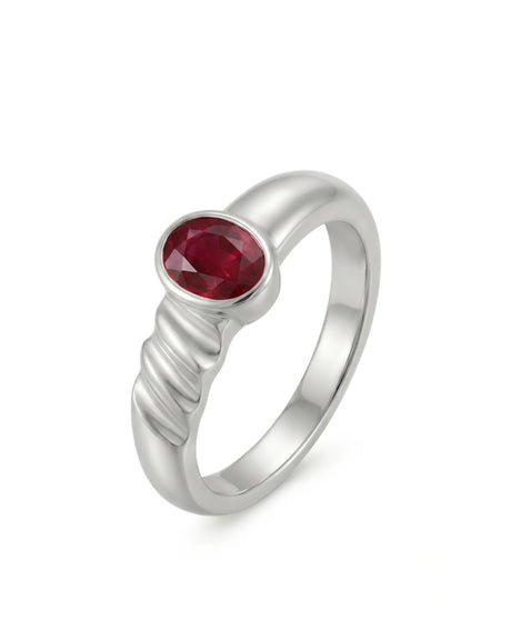 Bezel set oval natural ruby solitaire ring in 18K white gold with sculpted wave band | SARATTI