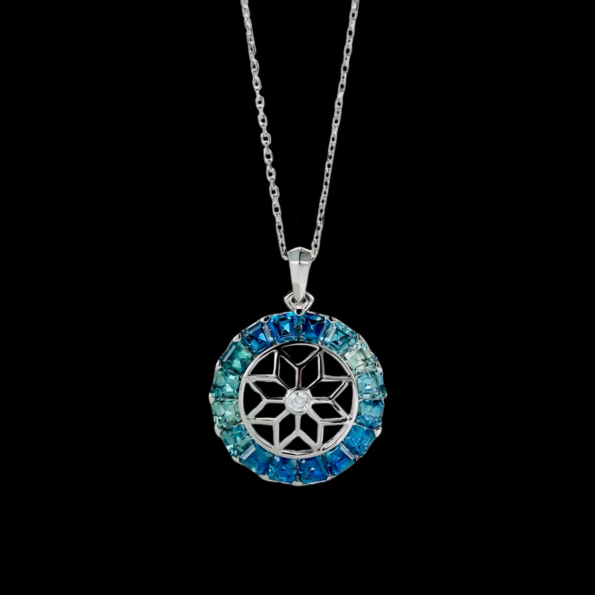 Blue Sapphire Pendant Necklace with Snowflake Motif  | Saratti