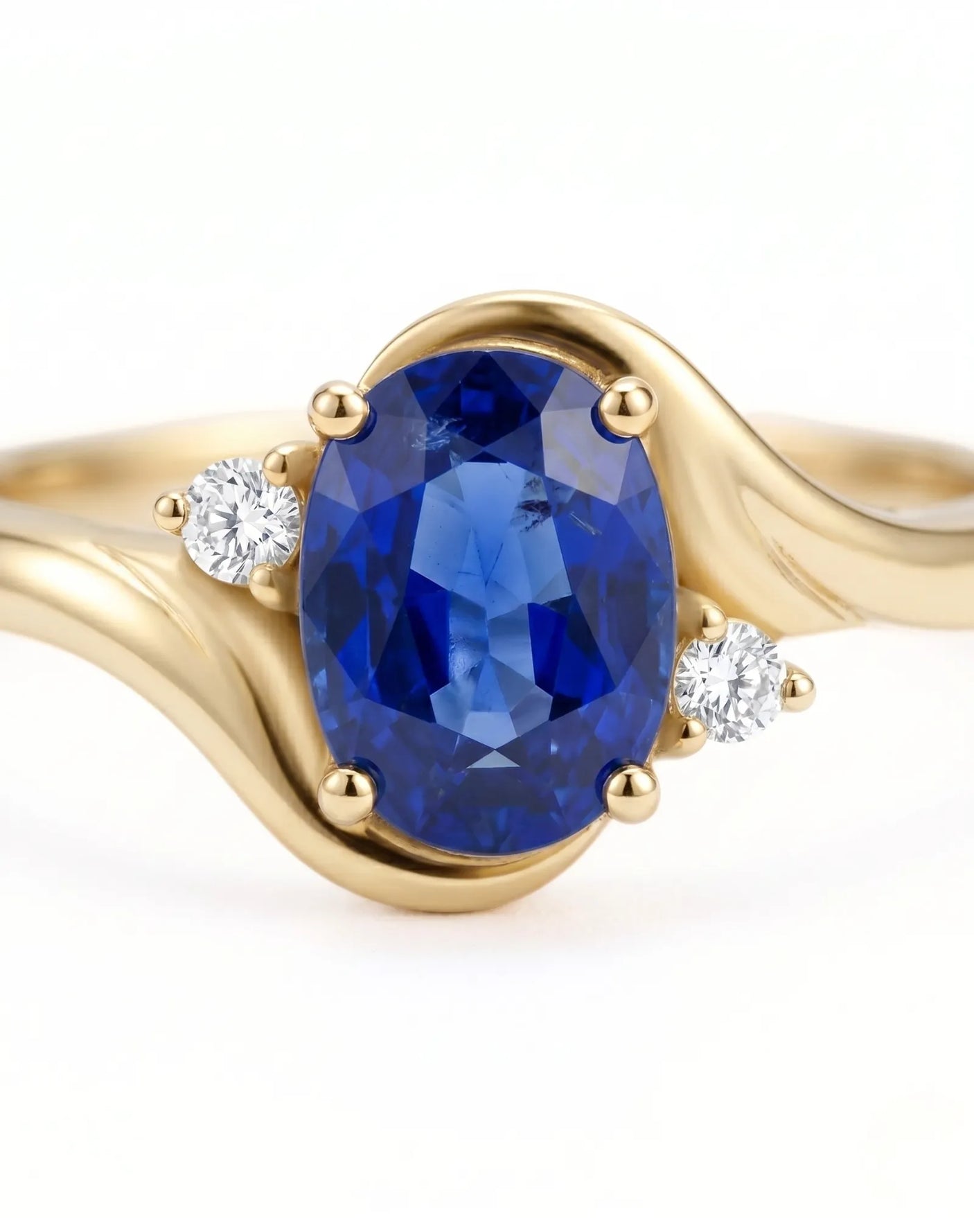 Blue Sapphire Promise ring with graceful flowing band in 18K yellow gold | SARATTI