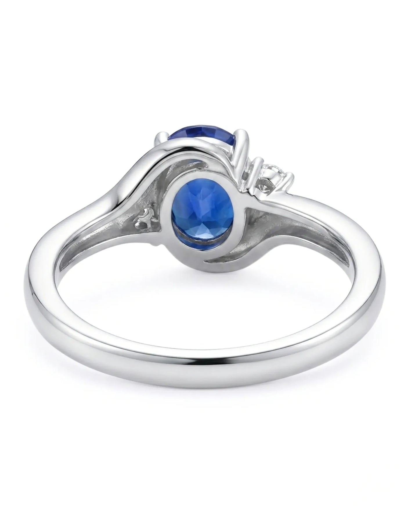 Blue Sapphire Promise ring with graceful flowing band in platinum | SARATTI