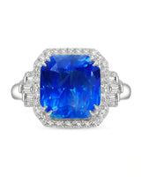 Blue cushion sapphire ring with round and baguette diamonds in enduring platinum | SARATTI