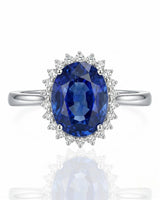 Blue oval sapphire ring with brilliant diamond accents in 18K white gold | SARATTI