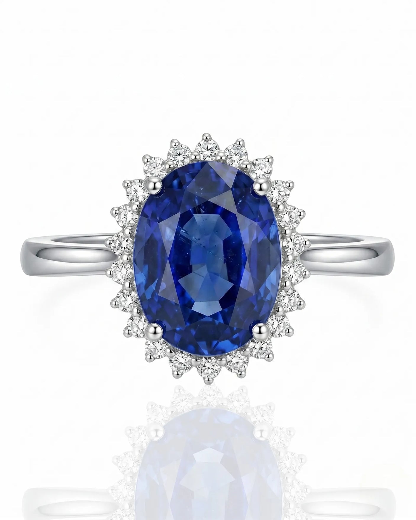 Blue oval sapphire ring with brilliant diamond accents in enduring platinum | SARATTI