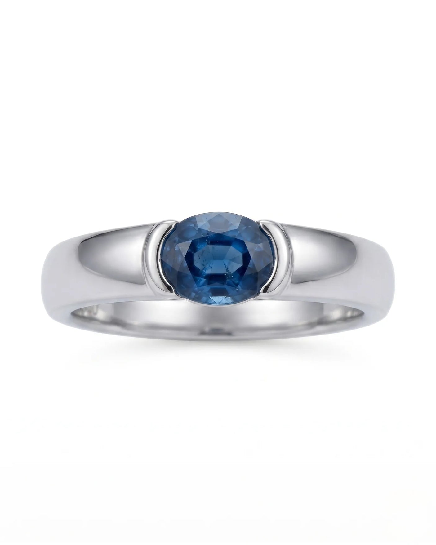Blue oval sapphire ring with protective bezel design in enduring platinum - SARATTI