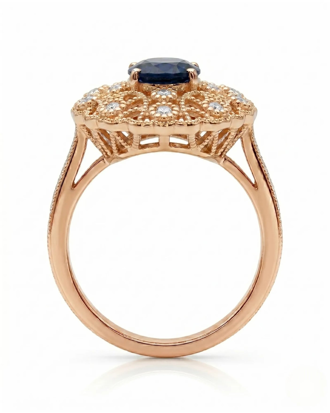 Blue oval sapphire ring with round diamond details and milgrain rose gold setting | SARATTI