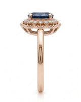 Blue oval sapphire ring with round natural diamonds in 18K rose gold | SARATTI
