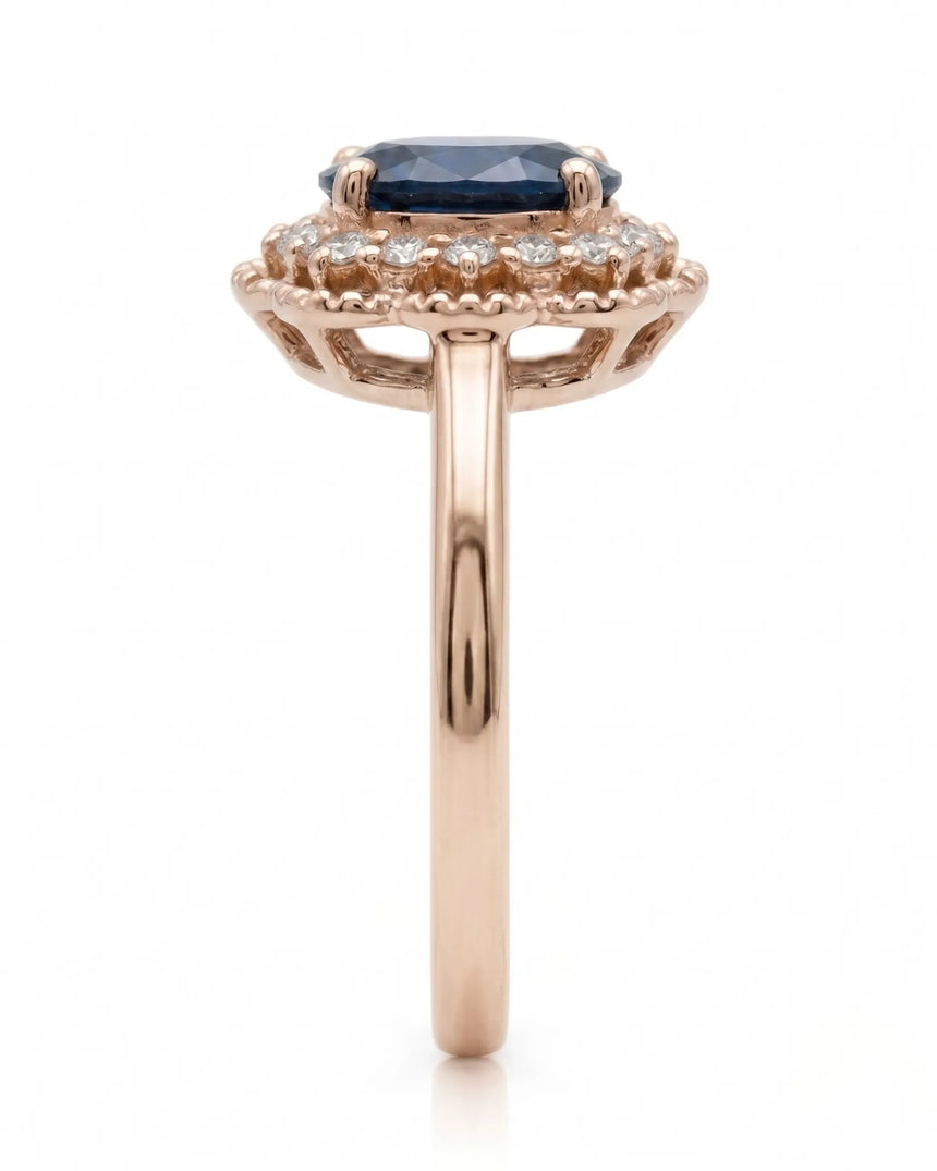 Blue oval sapphire ring with round natural diamonds in 18K rose gold | SARATTI