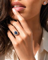 Blue oval sapphire ring with round natural diamonds in 18K white gold | SARATTI