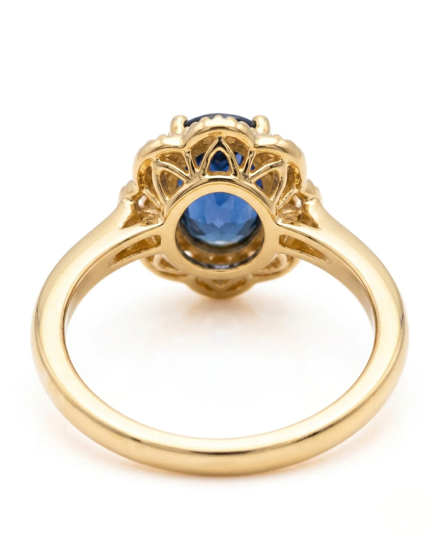 Blue oval sapphire ring with round natural diamonds in 18K yellow gold - SARATTI