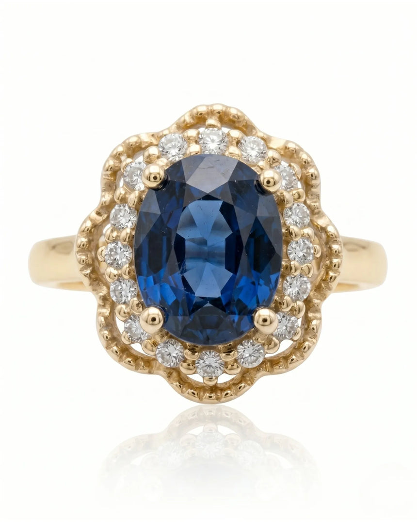 Blue oval sapphire ring with round natural diamonds in 18K yellow gold | SARATTI