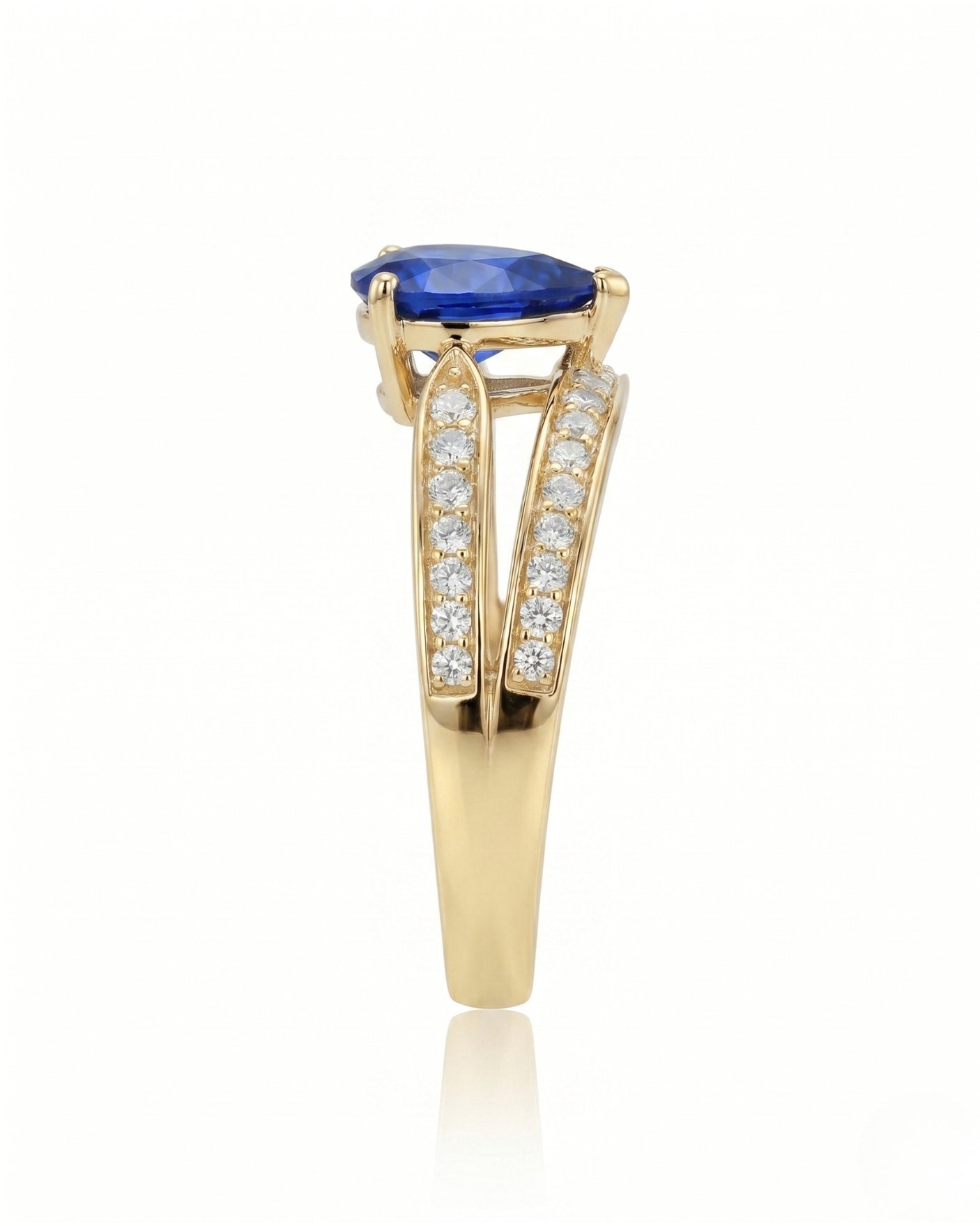 Blue sapphire and diamond engagement ring in 18K yellow gold for meaningful gifting - SARATTI
