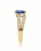 Blue sapphire and diamond engagement ring in 18K yellow gold for meaningful gifting - SARATTI
