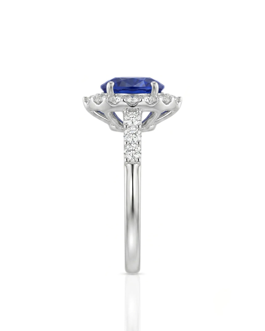 Blue sapphire and diamond engagement ring with halo in 18K white gold | SARATTI