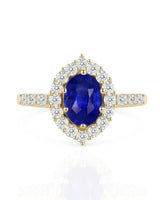 Blue sapphire and diamond engagement ring with halo in 18K yellow gold | SARATTI