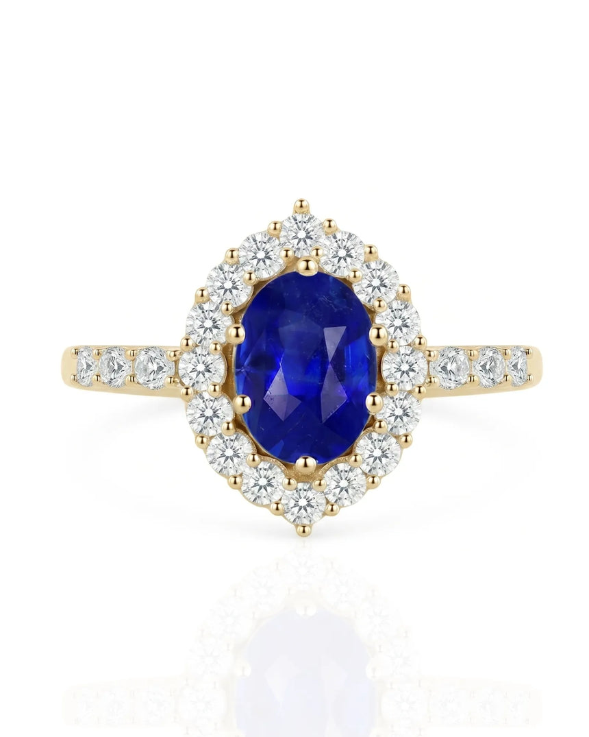 Blue sapphire and diamond engagement ring with halo in 18K yellow gold | SARATTI