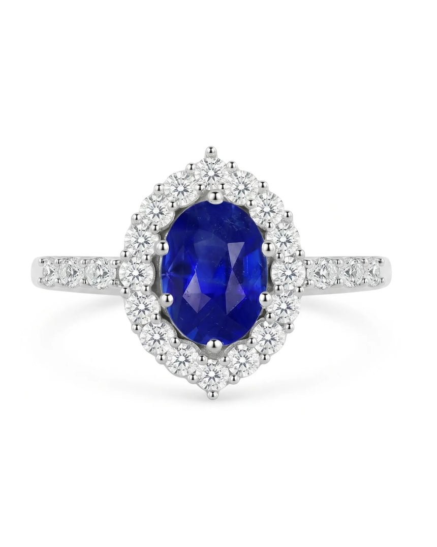 Blue sapphire and diamond engagement ring with halo in platinum | SARATTI