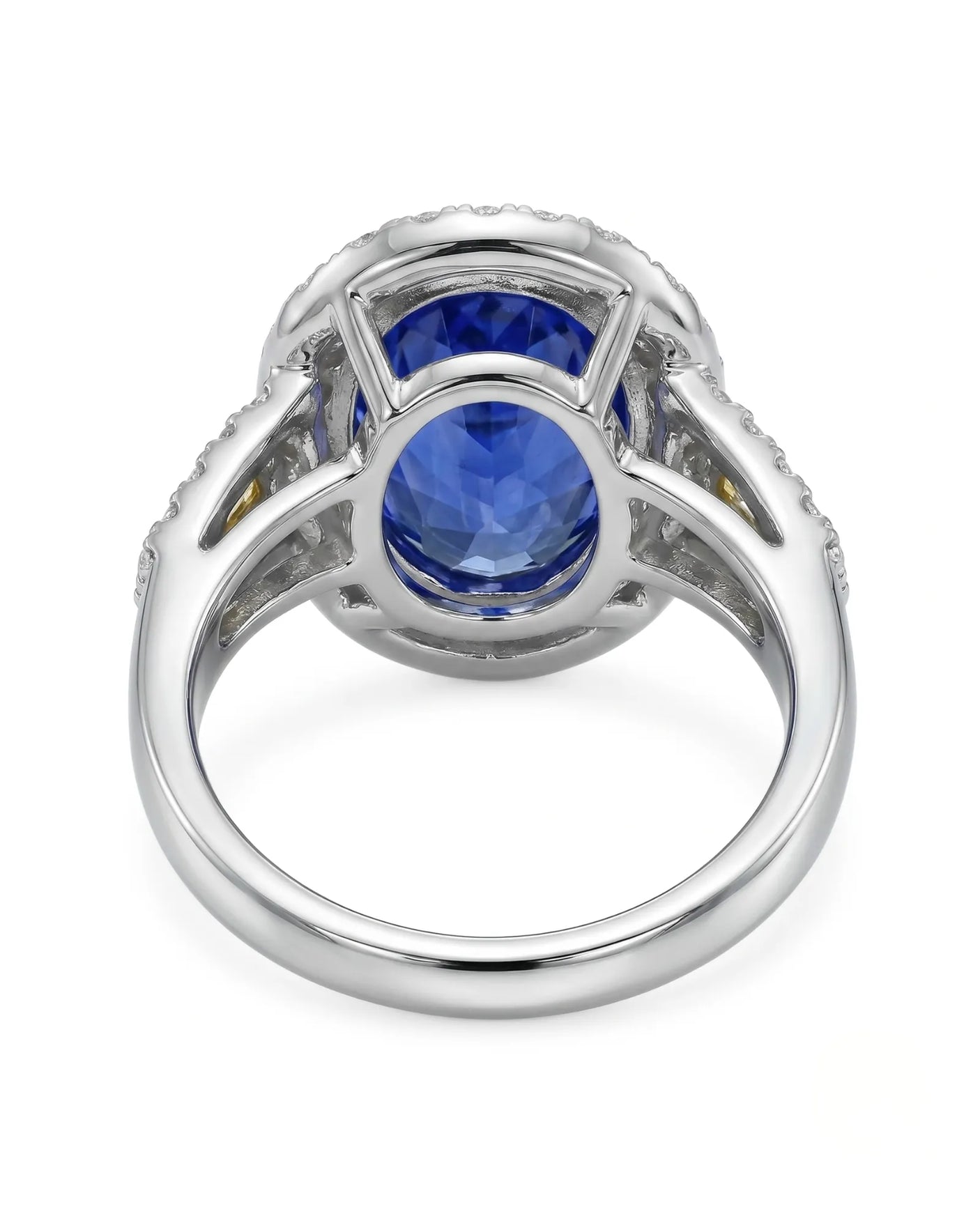 Blue sapphire engagement ring with diamond halo and yellow shoulder stones in 18K white gold | SARATTI