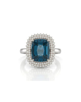 Blue tourmaline engagement ring with double diamond halo in refined polished platinum | SARATTI
