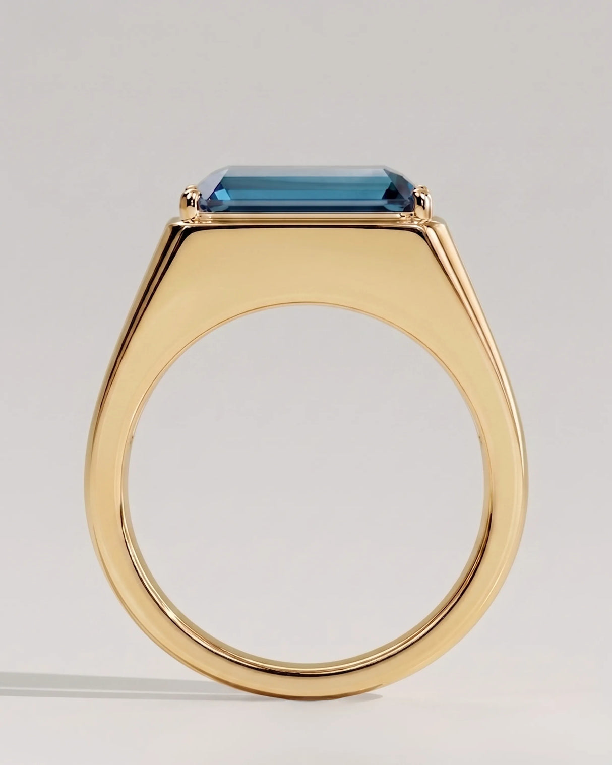 Bold men’s gemstone ring London blue topaz center yellow gold | SARATTI