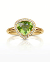 Bright green tourmaline ring with delicate diamond halo and 18K Yellow Gold setting | SARATTI