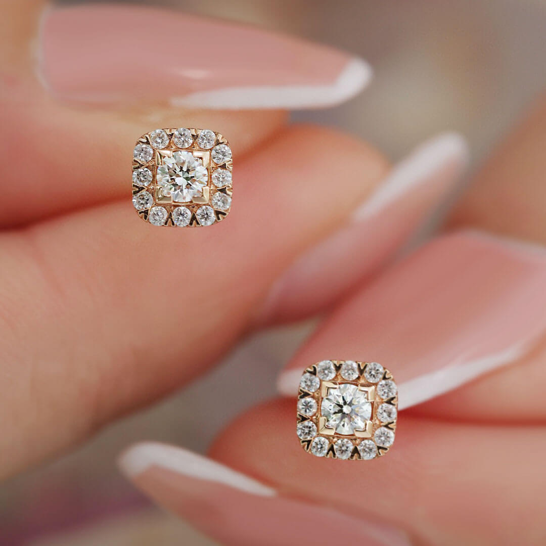 Bezel Set Tiny Round Diamond Stud Earrings in Model's Fingers  | Saratti | Custom High and Fine Jewelry