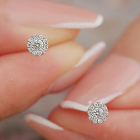 Stunning Minimalist Halo Diamond Earrings in Model's Fingers  | Saratti | Custom High and Fine Jewelry 