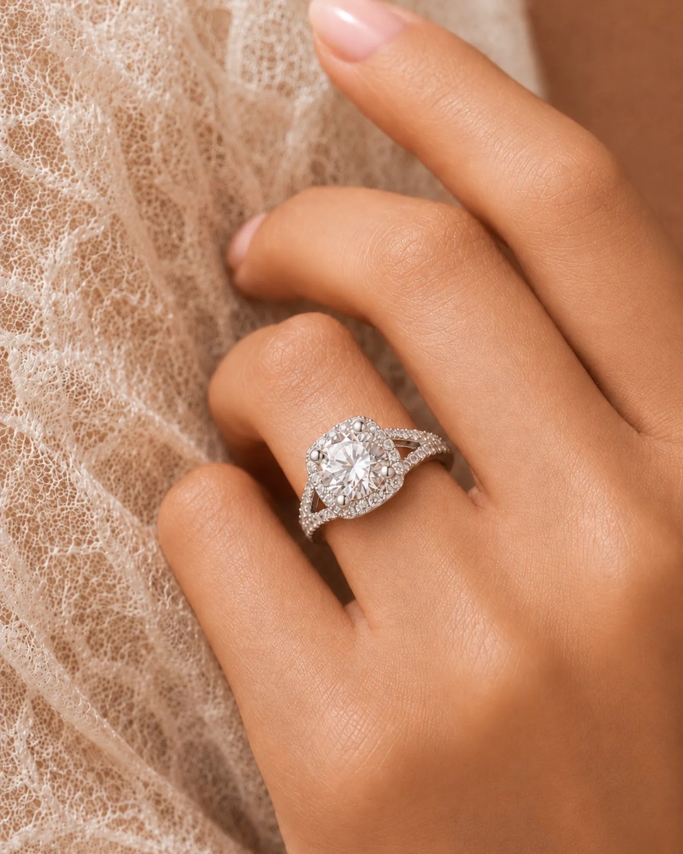 Brilliant round diamond ring surrounded by accent diamonds in an enduring polished platinum setting | SARATTI