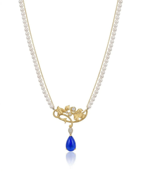 CELÉSTE tanzanite pearl necklace with teardrop blue gemstone, Akoya pearls and sculpted 18K gold detail | SARATTI