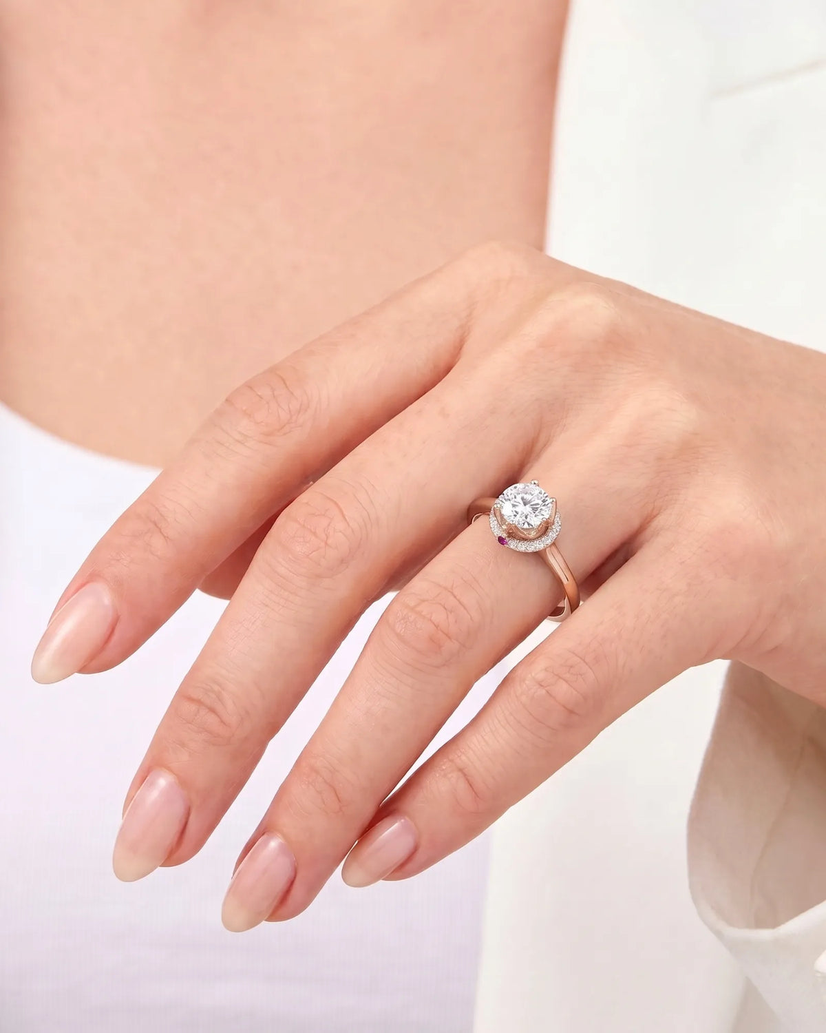 Cesca natural round diamond lotus illusion engagement ring model hand view in 18K rose gold | SARATTI
