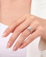 Cesca natural round diamond lotus illusion engagement ring model hand view in 18K rose gold | SARATTI