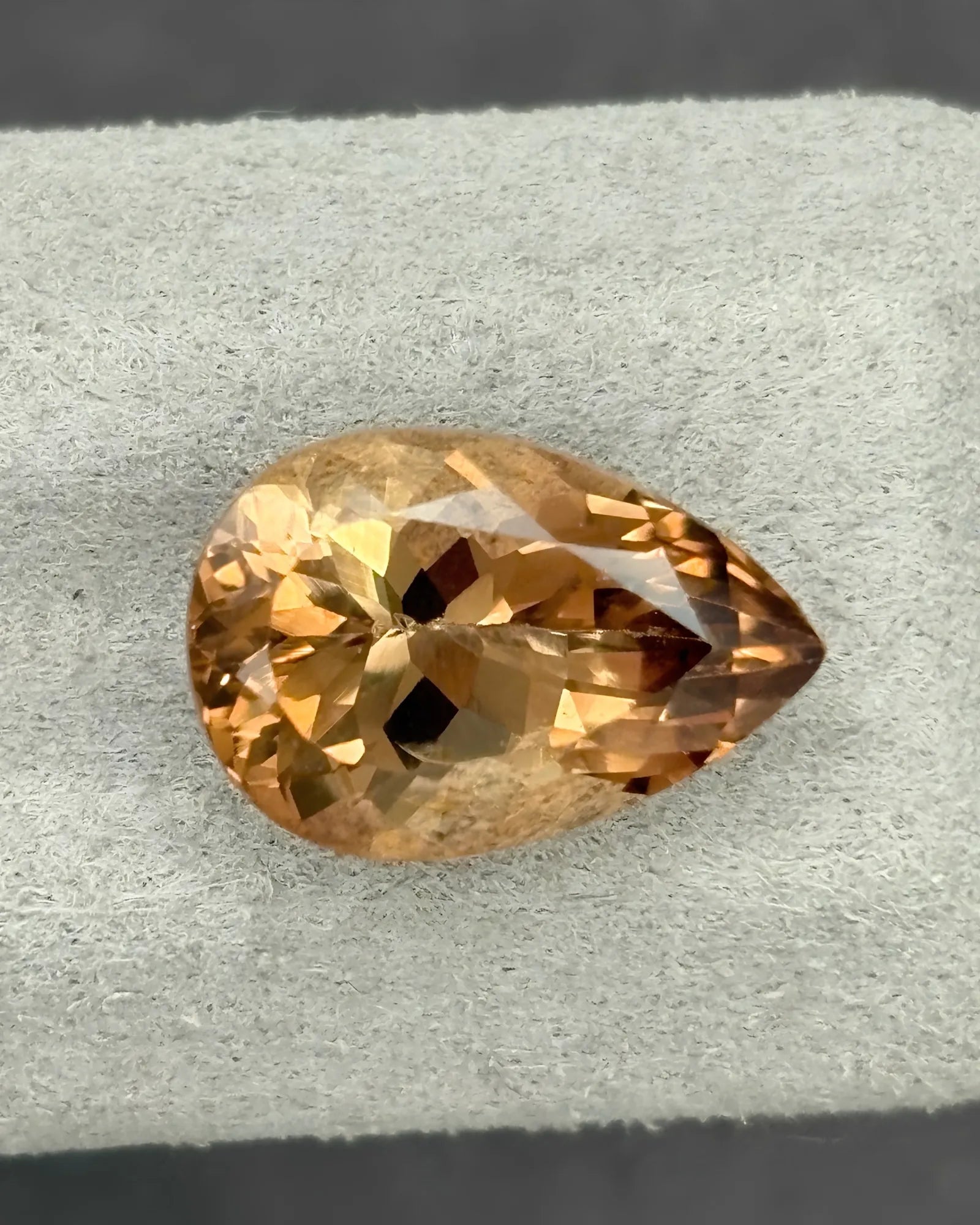 Champagne Imperial Topaz pear-cut alternate angle | SARATTI