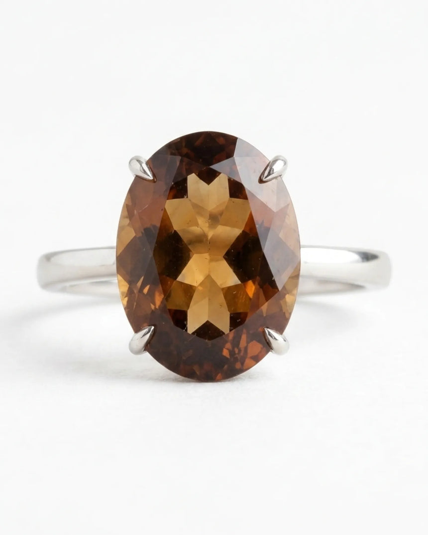 Champagne oval Imperial Topaz ring with four-prong setting and open floral basket in 18K white gold | SARATTI